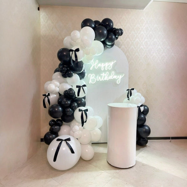 White and Black balloon birthday decoration in dubai UAE